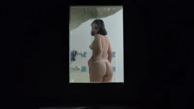 Jasmine teases a stranger filming through her window